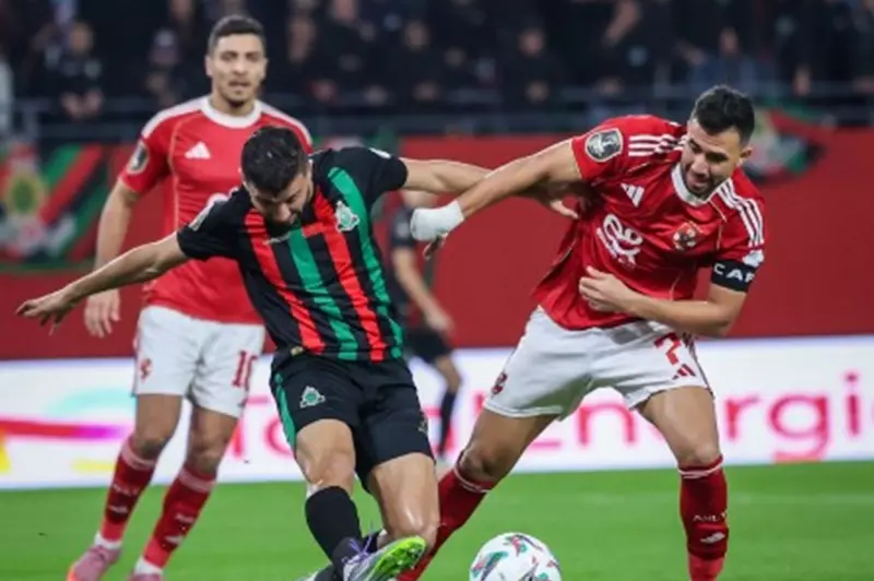 تفاصيل صادمة حول مشاجرة لاعبي الأهلي والجيش الملكي: إصابة تريزيجيه وتأثيرها